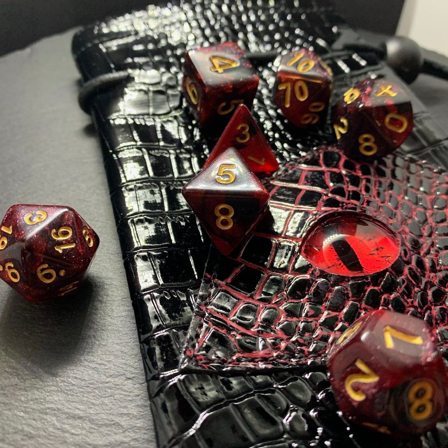 Red And Black Galaxy DnD 7 Dice Set And Hand Painted Dragon Eye Pouch Set In Vegan Patent Leather - Darkmoon Fayre