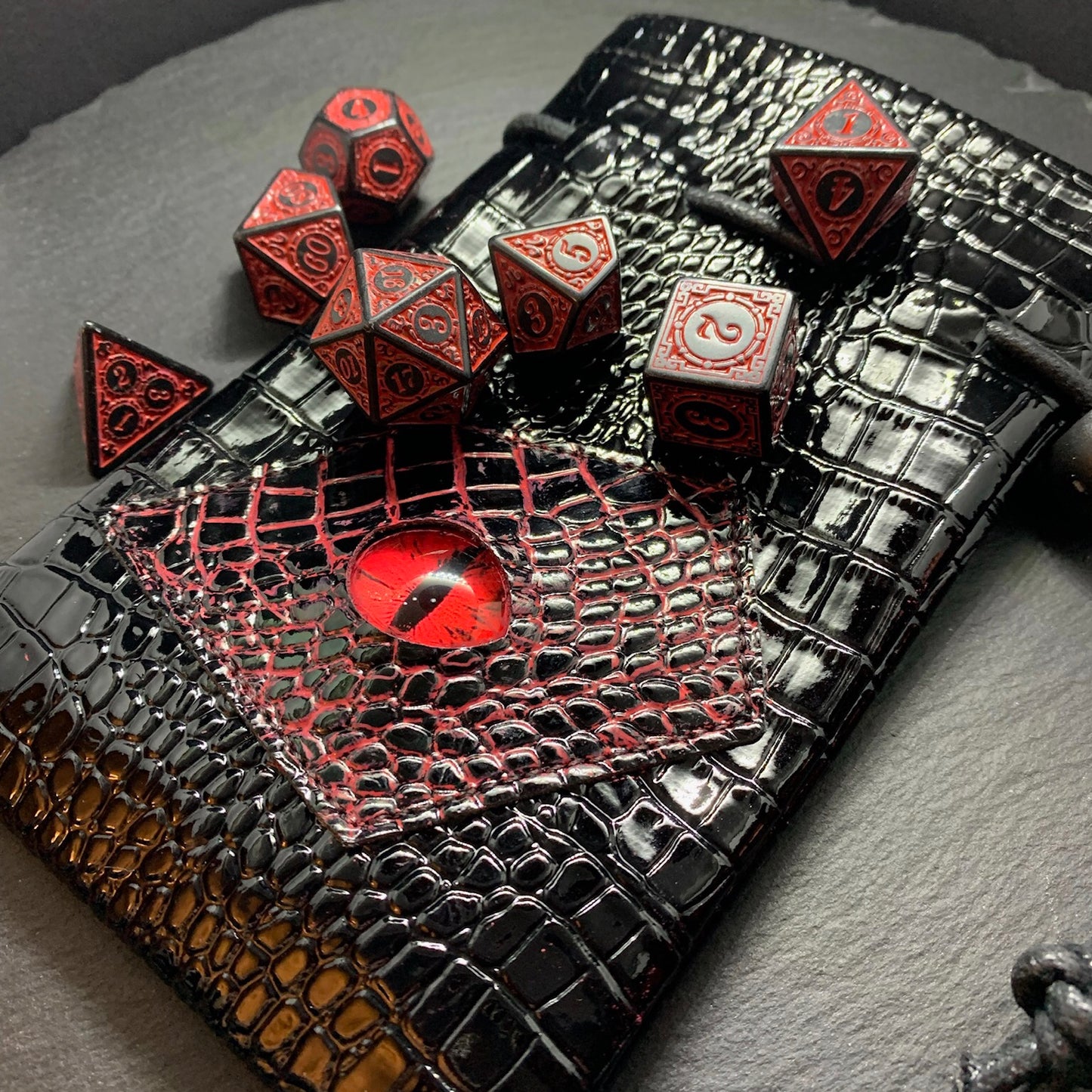 Red And Black Evocation DnD 7 Dice Set And Hand Painted Dragon Eye Pouch Set In Vegan Patent Leather - Darkmoon Fayre