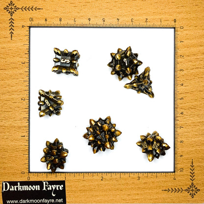DnD 7 Paladins Oath Ancient Gold Crystalline Shaped Solid Heavy Metal Polyhedral Dice Set With A Fairtrade Cotton Storage Pouch - Darkmoon Fayre