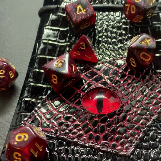 Red And Black Galaxy DnD 7 Dice Set And Hand Painted Dragon Eye Pouch Set In Vegan Patent Leather