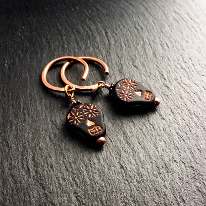 Sugar Skull Earrings for Stretched Ears. Gothic Black Glass Skulls. Hand-forged Copper Ear-Wires - Darkmoon Fayre