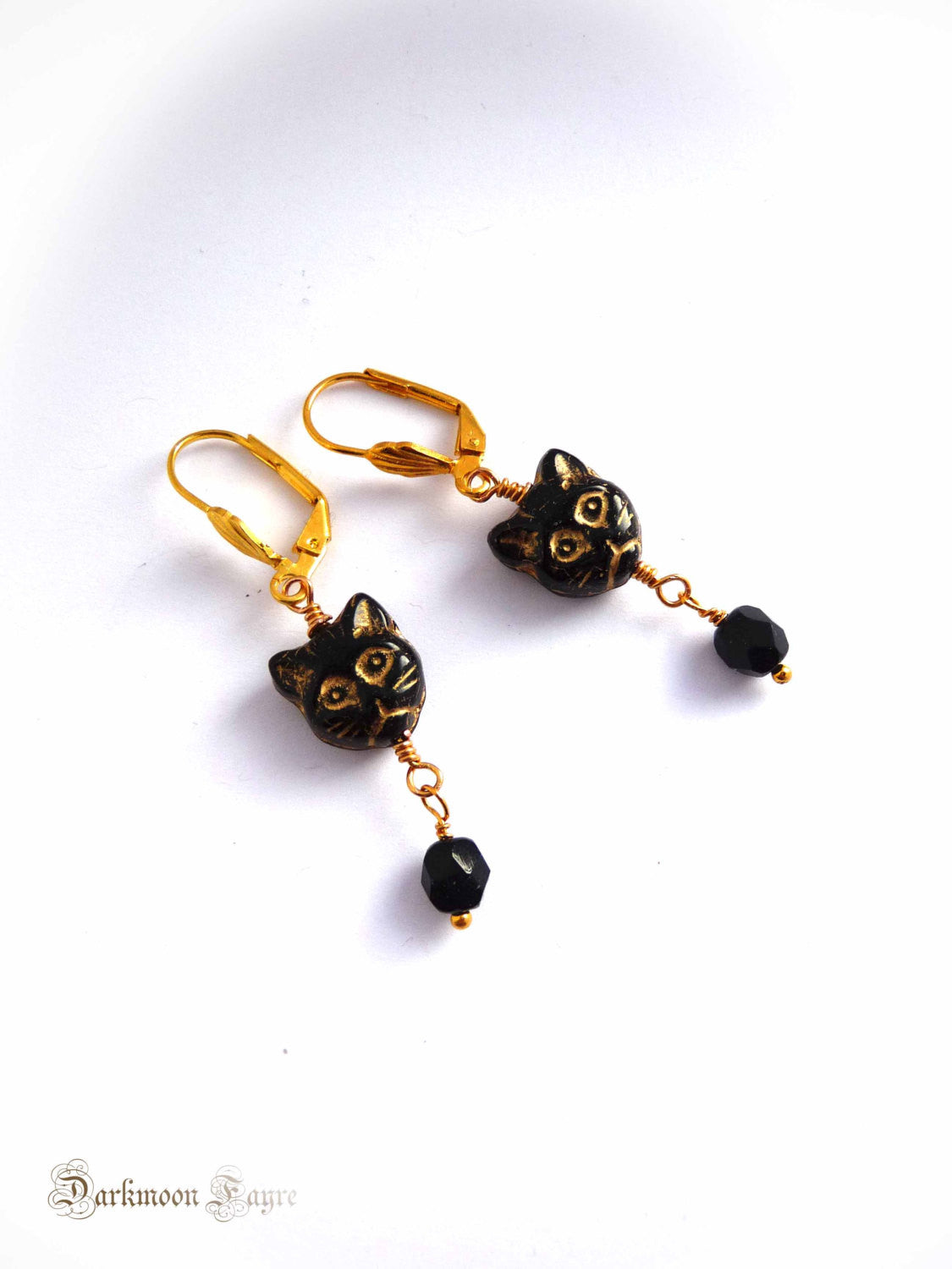 Black Glass Cat Face & Black Faceted Bead Earrings. Czech Pressed and Fire Polished Glass. Hand Wired Wrapped. Yellow Gold Plate Findings. - Darkmoon Fayre