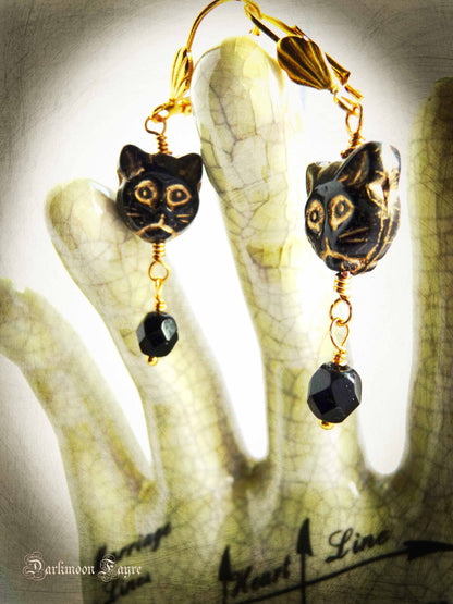 Black Glass Cat Face & Black Faceted Bead Earrings. Czech Pressed and Fire Polished Glass. Hand Wired Wrapped. Yellow Gold Plate Findings. - Darkmoon Fayre