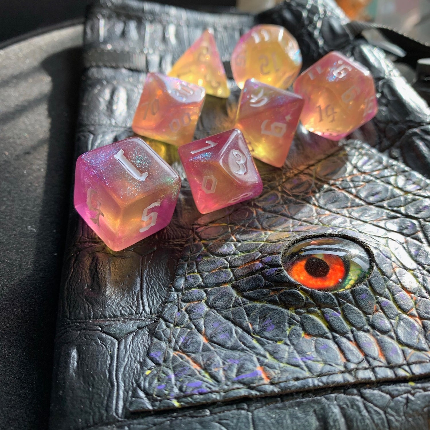 Aurora Lemon Pink DnD 7 Dice Set And Hand Painted Dragon Eye Pouch Set In Vegan Leather - Darkmoon Fayre